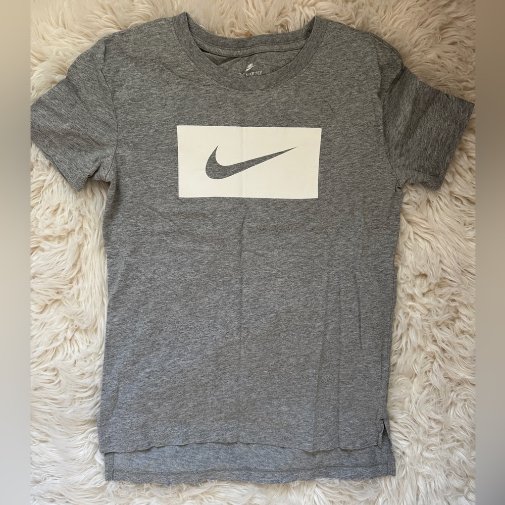 grey nike sportswear tee. size x-small fits like a small 
hardly worn
